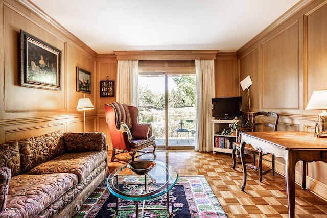 living room featuring light parquet flooring and crown molding