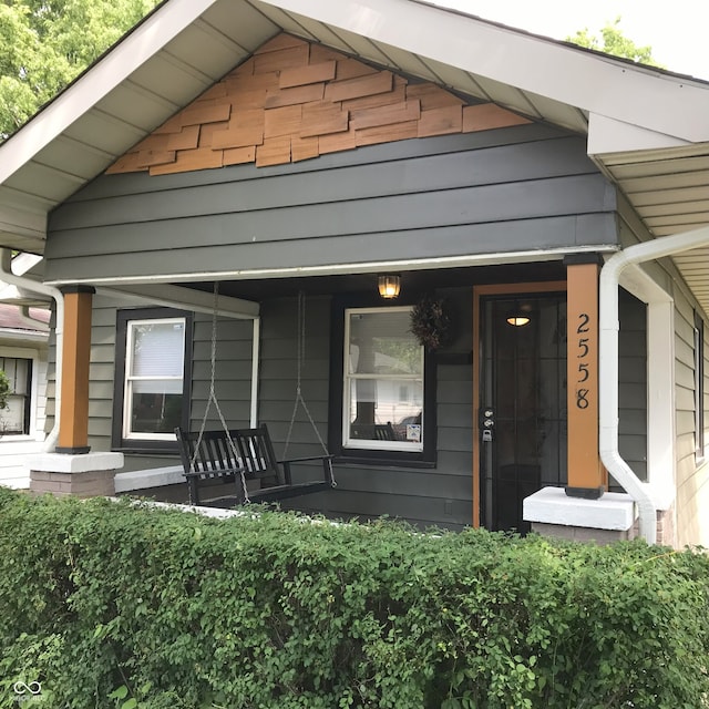 entrance to property with covered porch