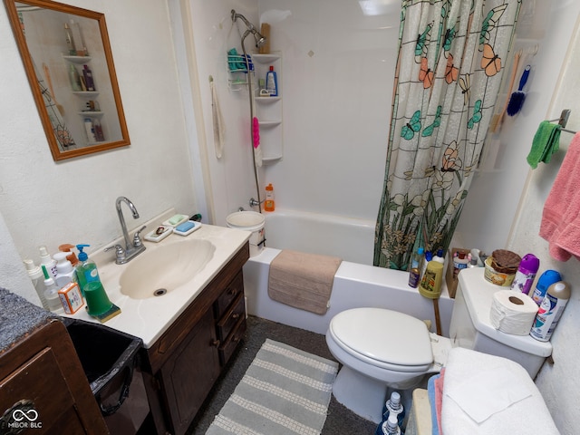 full bathroom featuring vanity, shower / bath combo with shower curtain, and toilet