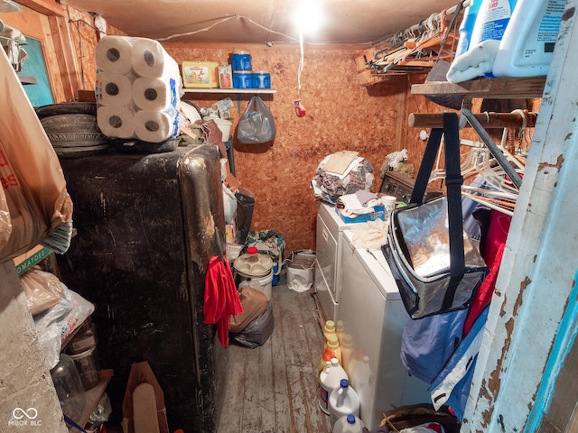 interior space featuring hardwood / wood-style floors and independent washer and dryer