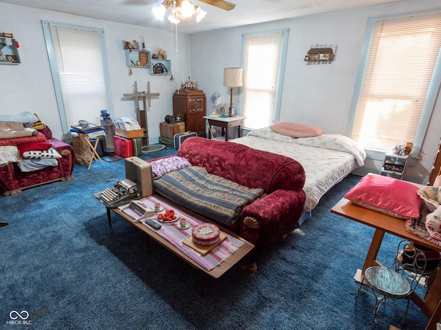 carpeted bedroom featuring ceiling fan