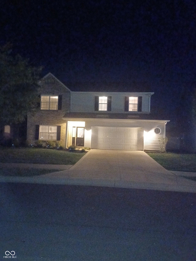 view of property featuring a garage