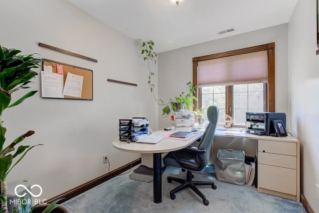 view of carpeted office space