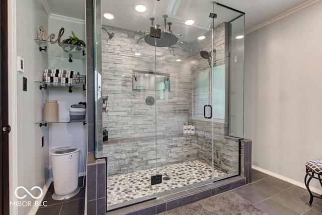 bathroom featuring tile patterned floors, ornamental molding, and an enclosed shower