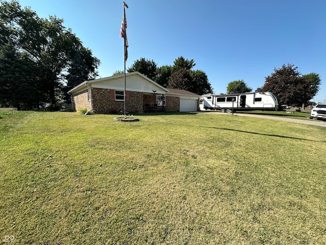 view of yard featuring a garage