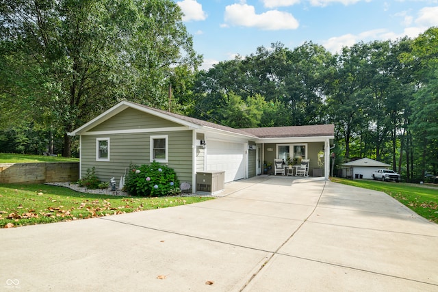 ranch-style house featuring a garage