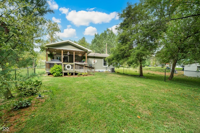 view of yard with a deck