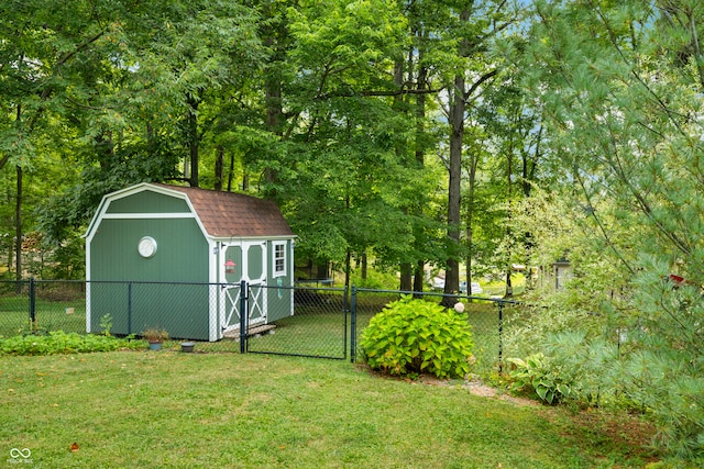 view of outbuilding featuring a yard