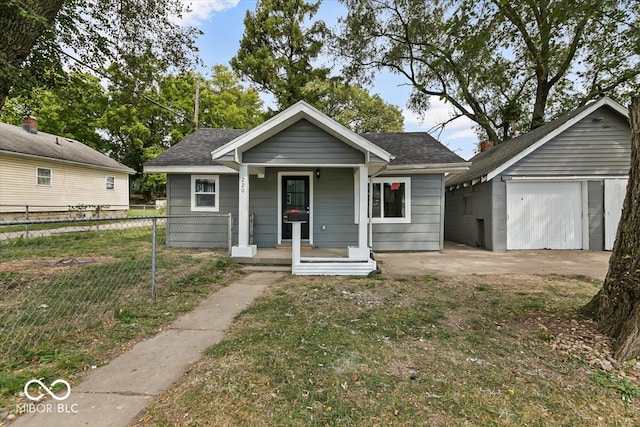 view of front of house featuring covered porch and a garage