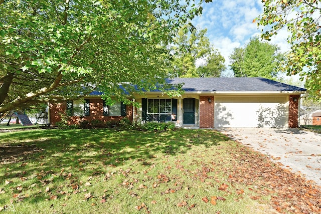 single story home with a front yard and a garage