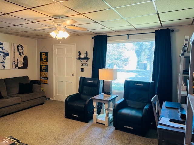 living room with a healthy amount of sunlight, carpet, and ceiling fan