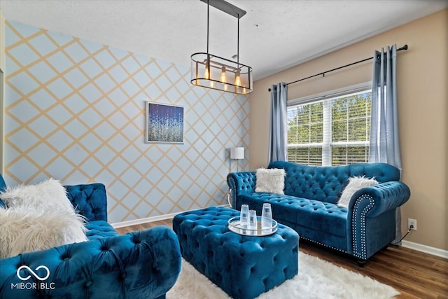 living room with a textured ceiling and dark wood-type flooring