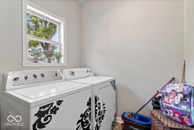 washroom featuring independent washer and dryer