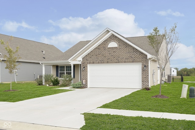 view of front facade featuring a garage and a front lawn