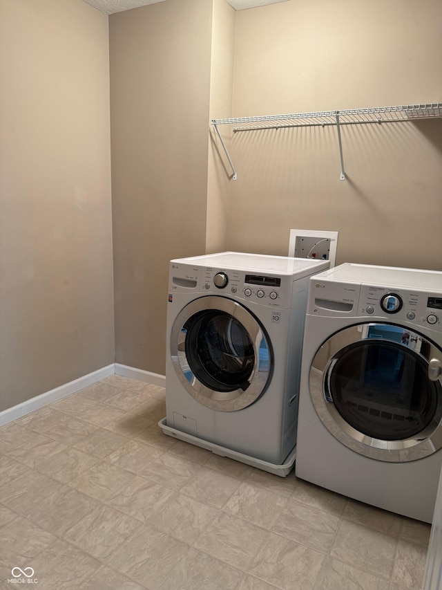 laundry room featuring washer and dryer