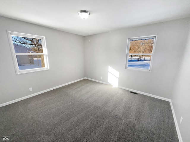 view of carpeted spare room