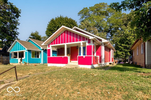 view of front of property with a front lawn and a porch