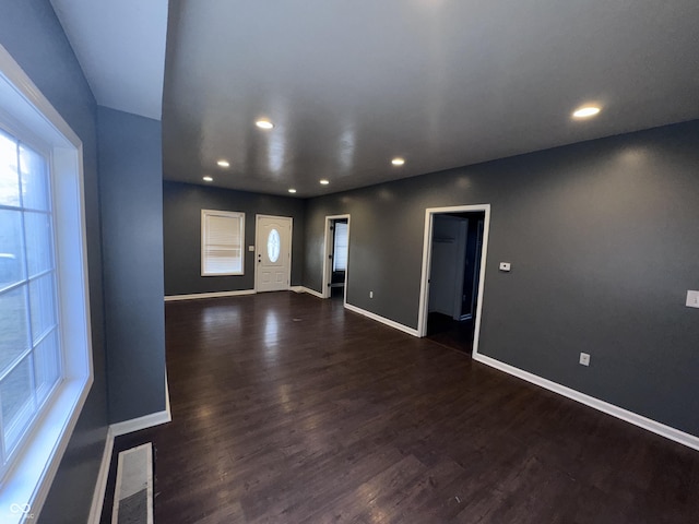 interior space with dark wood-type flooring