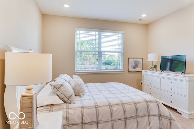 bedroom featuring carpet