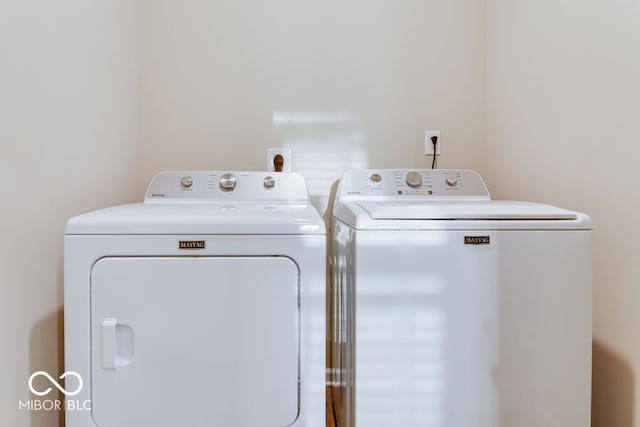 laundry area with washer and dryer