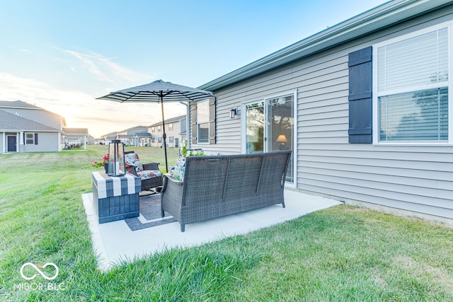 exterior space with a lawn and outdoor lounge area