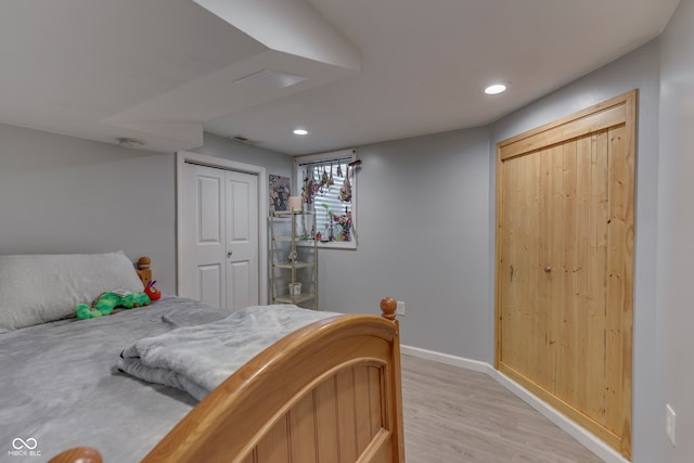 bedroom with light hardwood / wood-style flooring