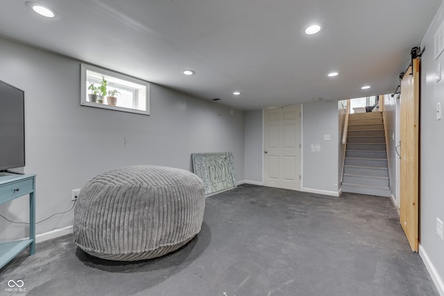 interior space featuring a barn door