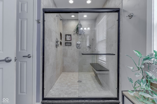 bathroom with an enclosed shower