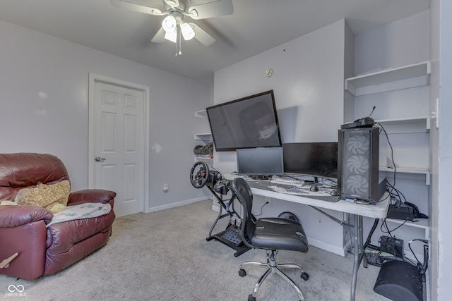 office space featuring ceiling fan and light colored carpet