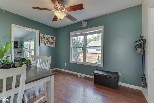 bedroom featuring ceiling fan, dark hardwood / wood-style floors, and vaulted ceiling