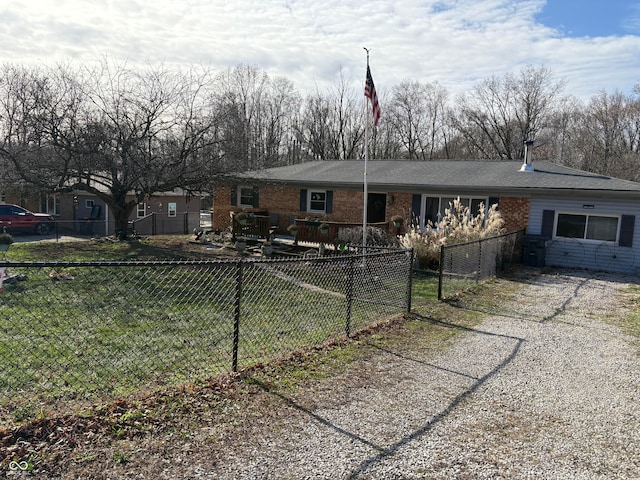 single story home with a front yard