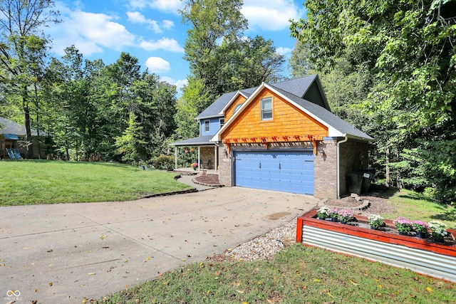 view of side of home featuring a lawn and a garage