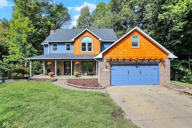 view of front facade featuring a porch, a garage, and a front lawn