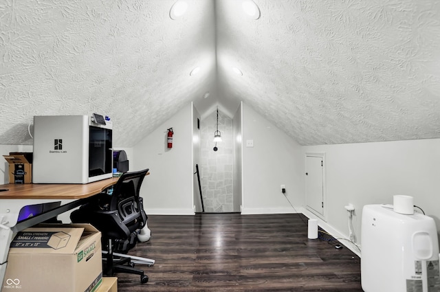 home office with vaulted ceiling, a textured ceiling, and dark hardwood / wood-style flooring