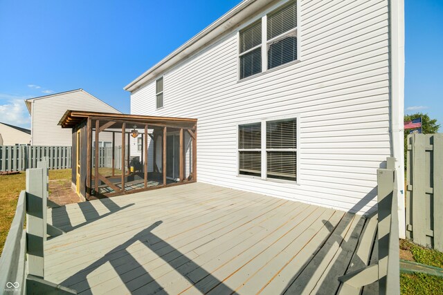 deck with a sunroom