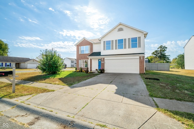 front facade with a front yard and a garage