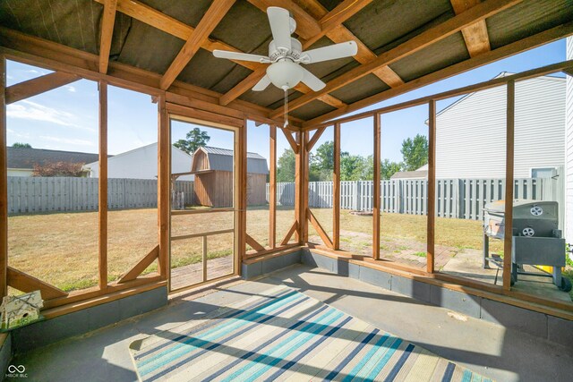 sunroom / solarium featuring ceiling fan and a healthy amount of sunlight