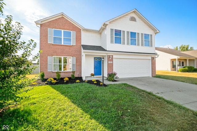 view of front facade featuring a front yard and a garage