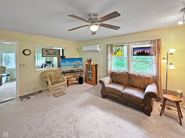 carpeted living room with plenty of natural light, ceiling fan, and a wall unit AC