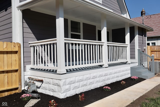 exterior space with a porch and central air condition unit