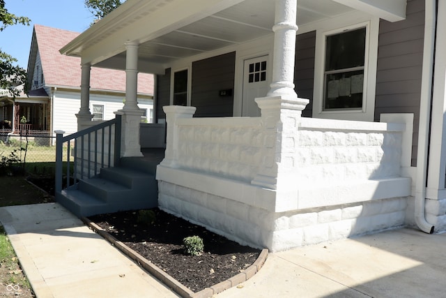 entrance to property with covered porch