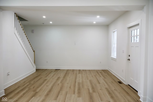 foyer with light hardwood / wood-style flooring