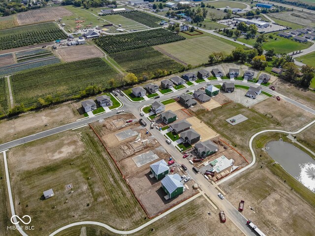 birds eye view of property featuring a rural view