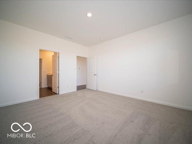 unfurnished bedroom featuring carpet