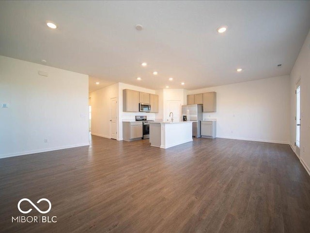 unfurnished living room with dark hardwood / wood-style flooring