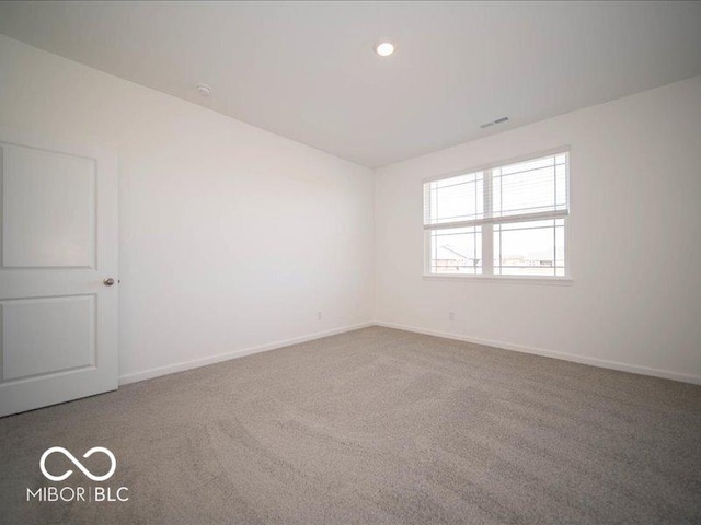 view of carpeted spare room