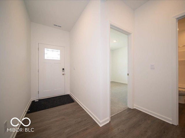 interior space with dark hardwood / wood-style floors