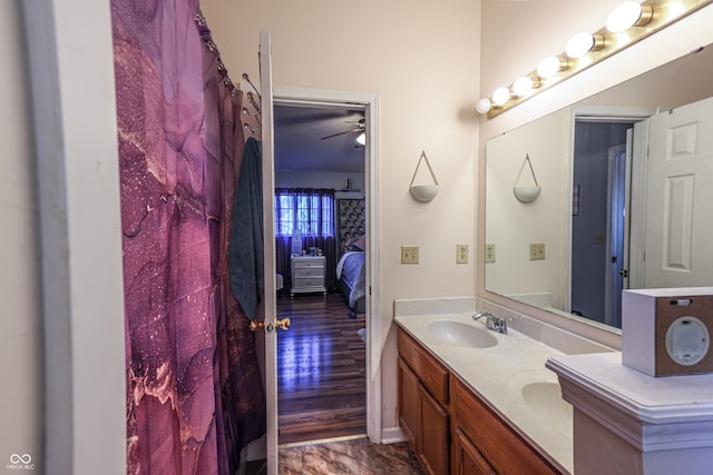 bathroom featuring vanity and hardwood / wood-style floors