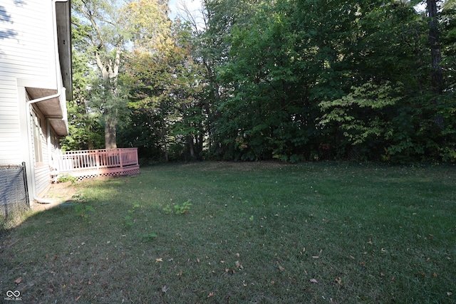 view of yard with a deck