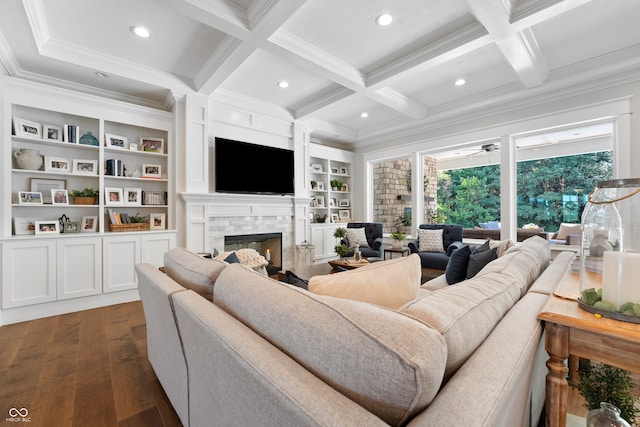 living room featuring coffered ceiling, dark hardwood / wood-style floors, and ornamental molding